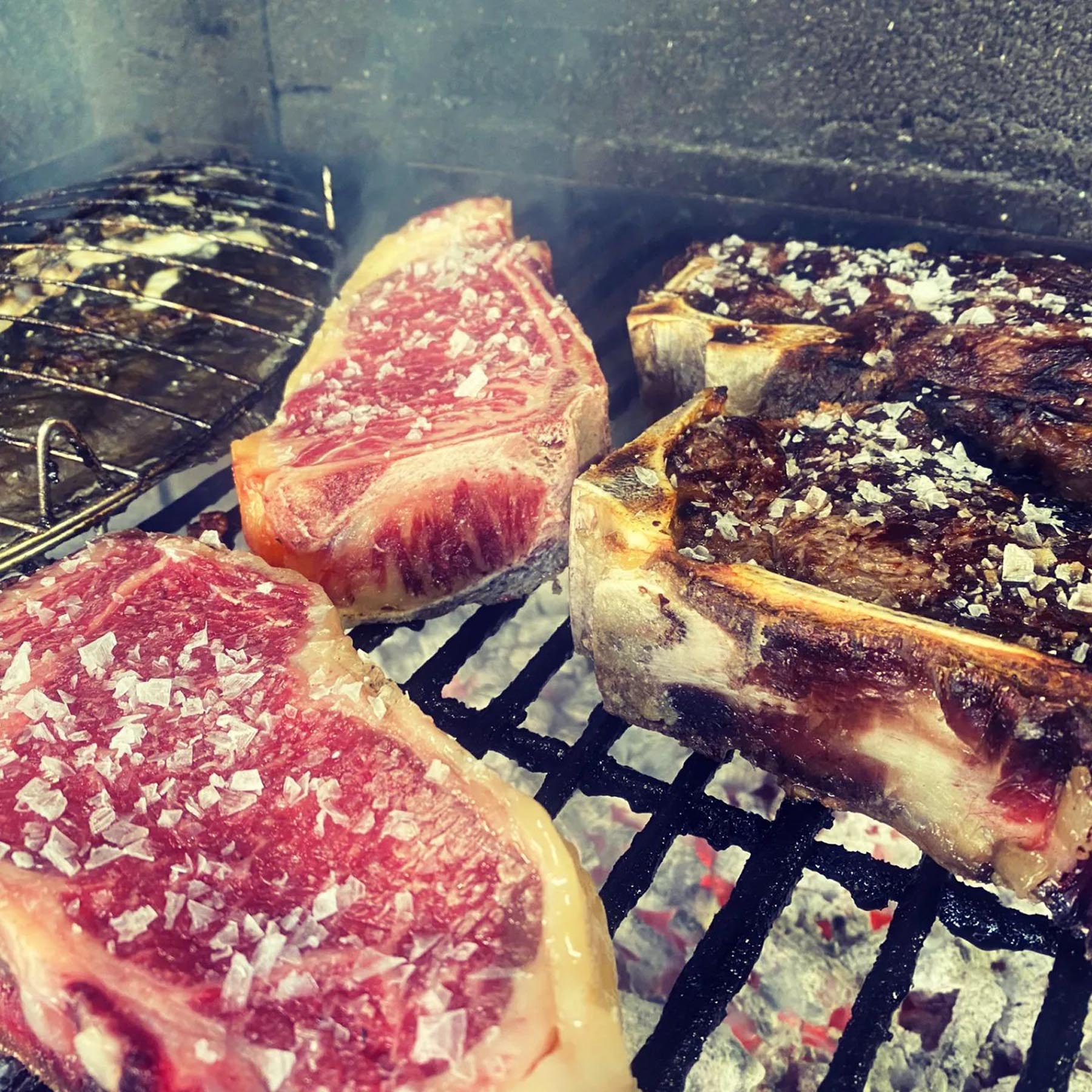 Steaks on the grill at Abarka Jatetxea, San Sebastian