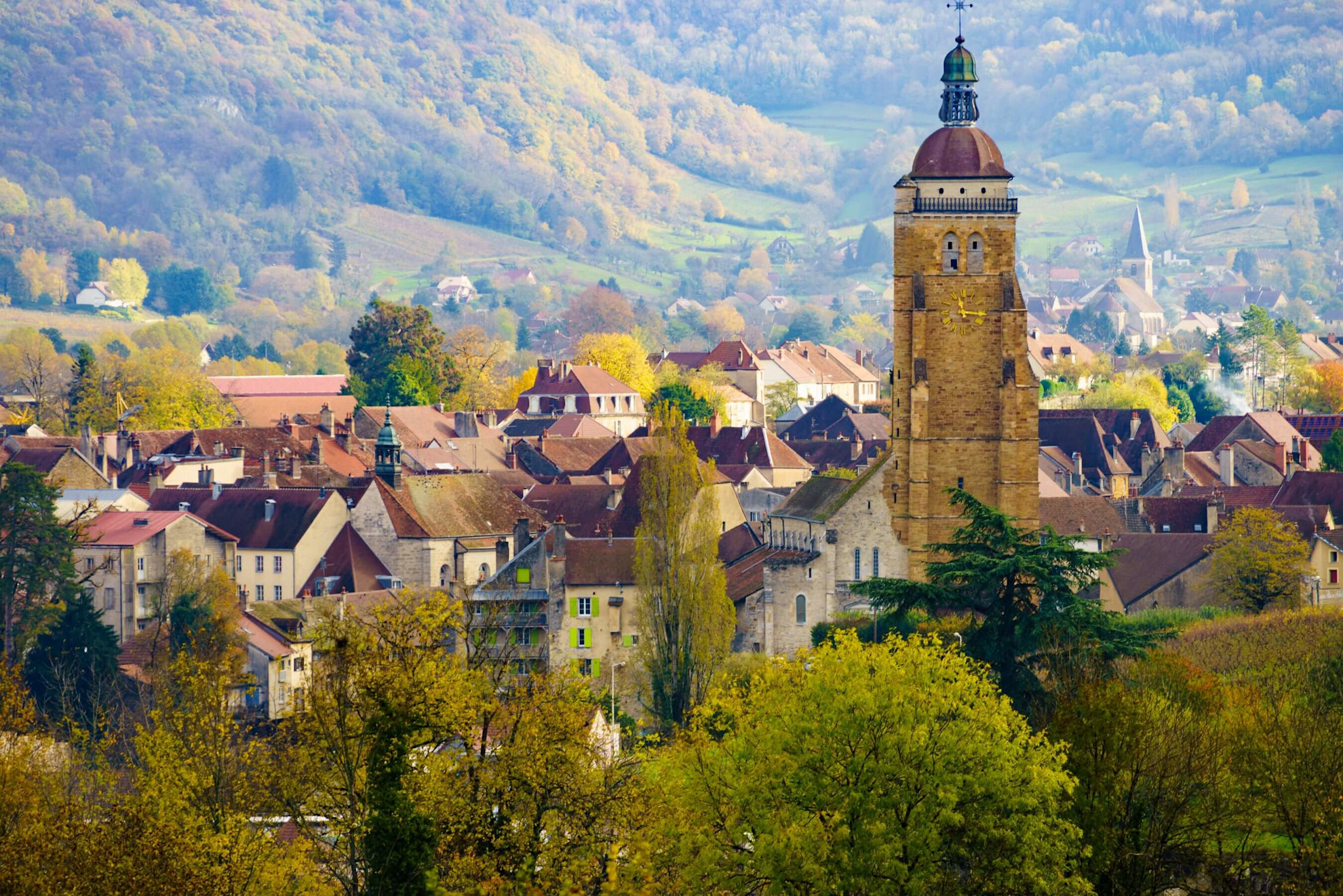 The 12th-century Église Saint Just and the rooftops of Arbois