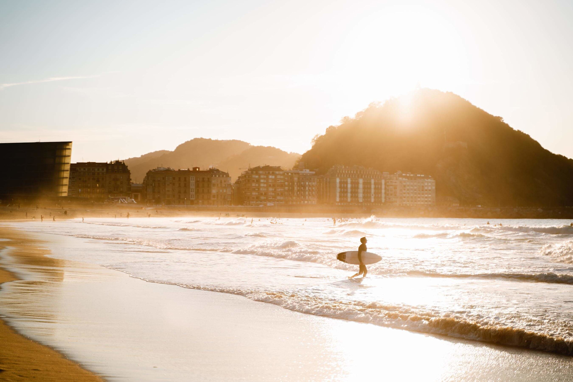 Surfer enjoying the waves at Zurriola Beach, San Sebastián
