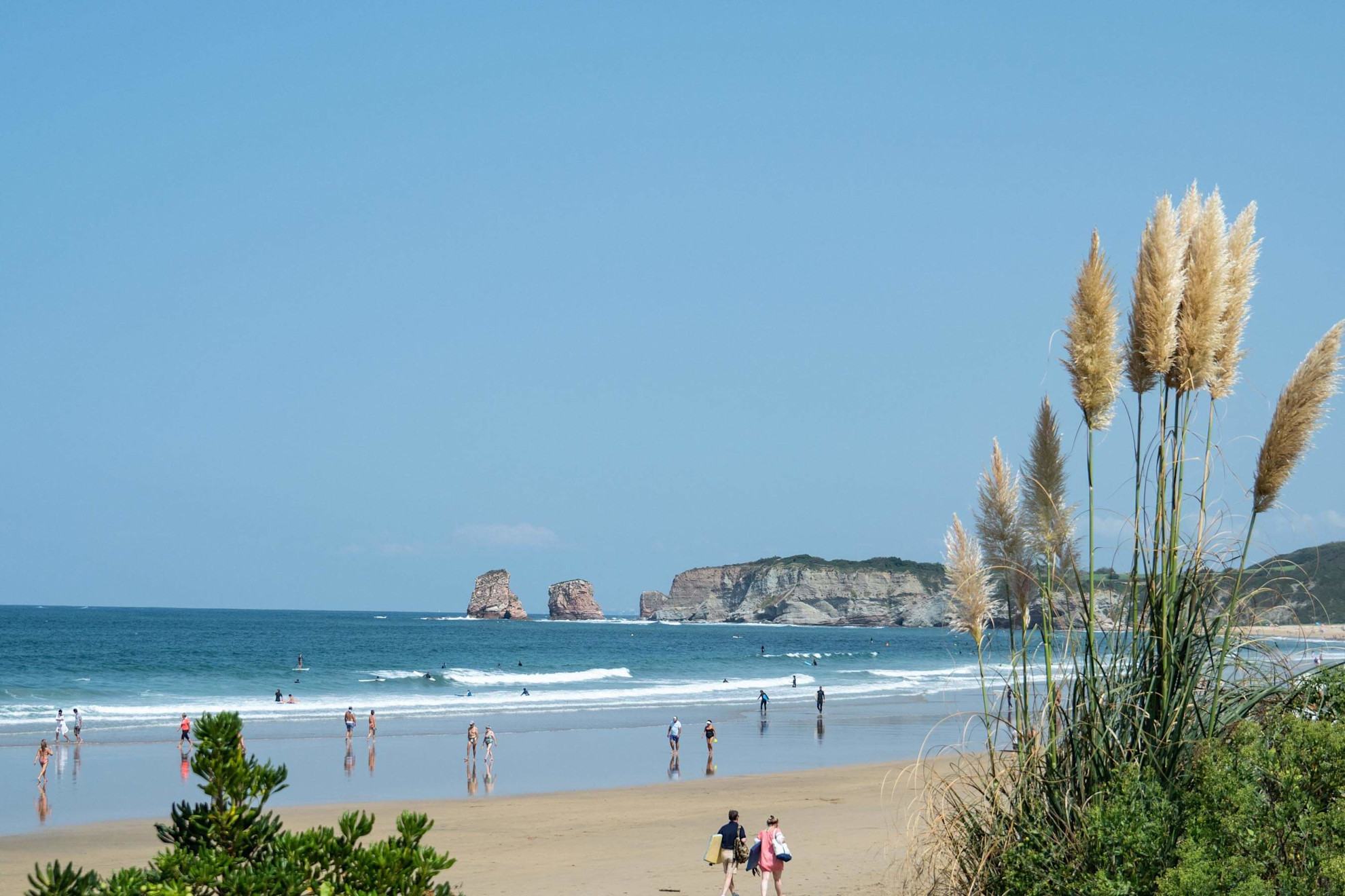 Hendaye beach, Nouvelle-Aquitaine, France, looking towards the rock of St.-Anne