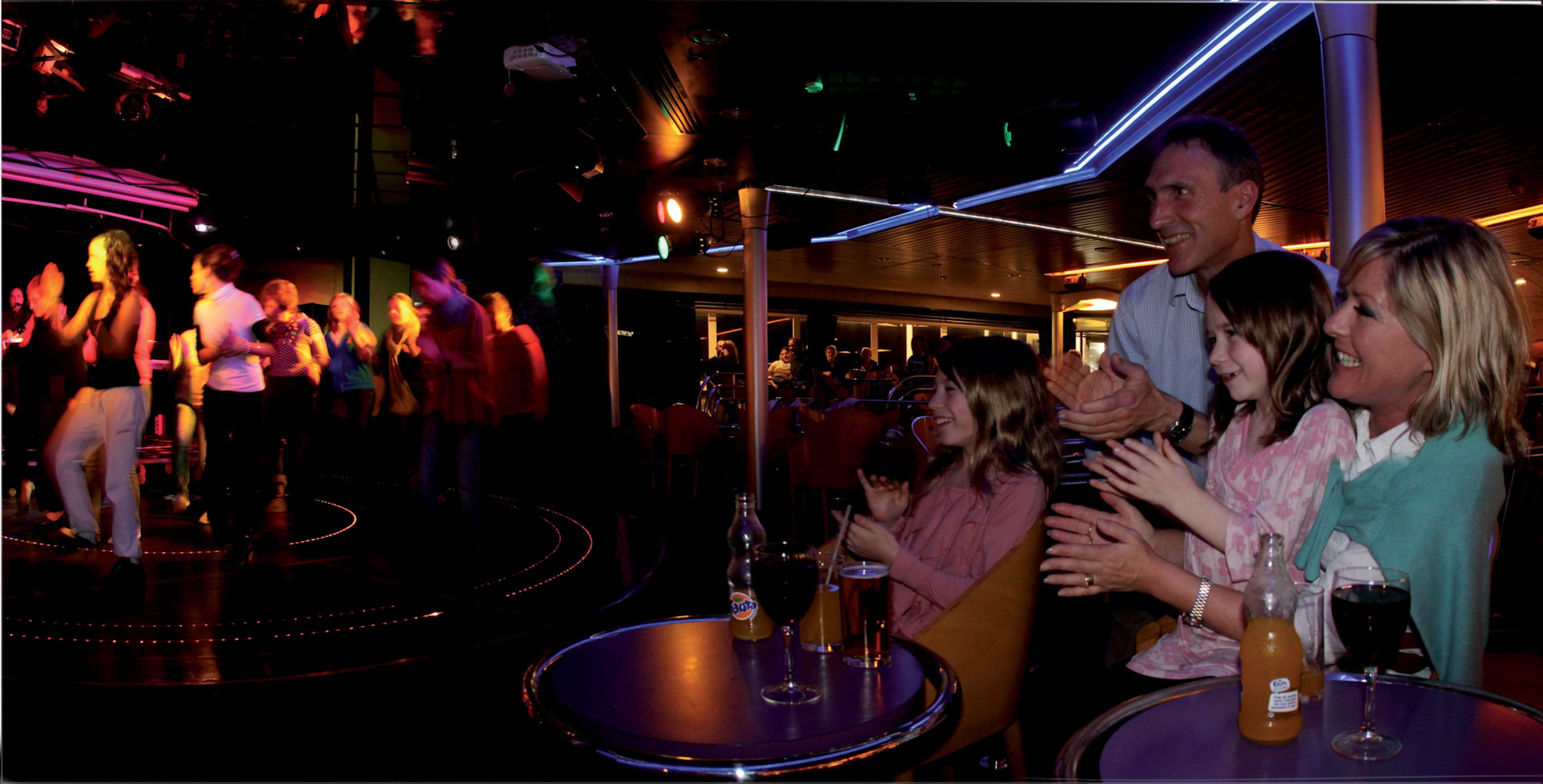 Family enjoying the onboard entertainment