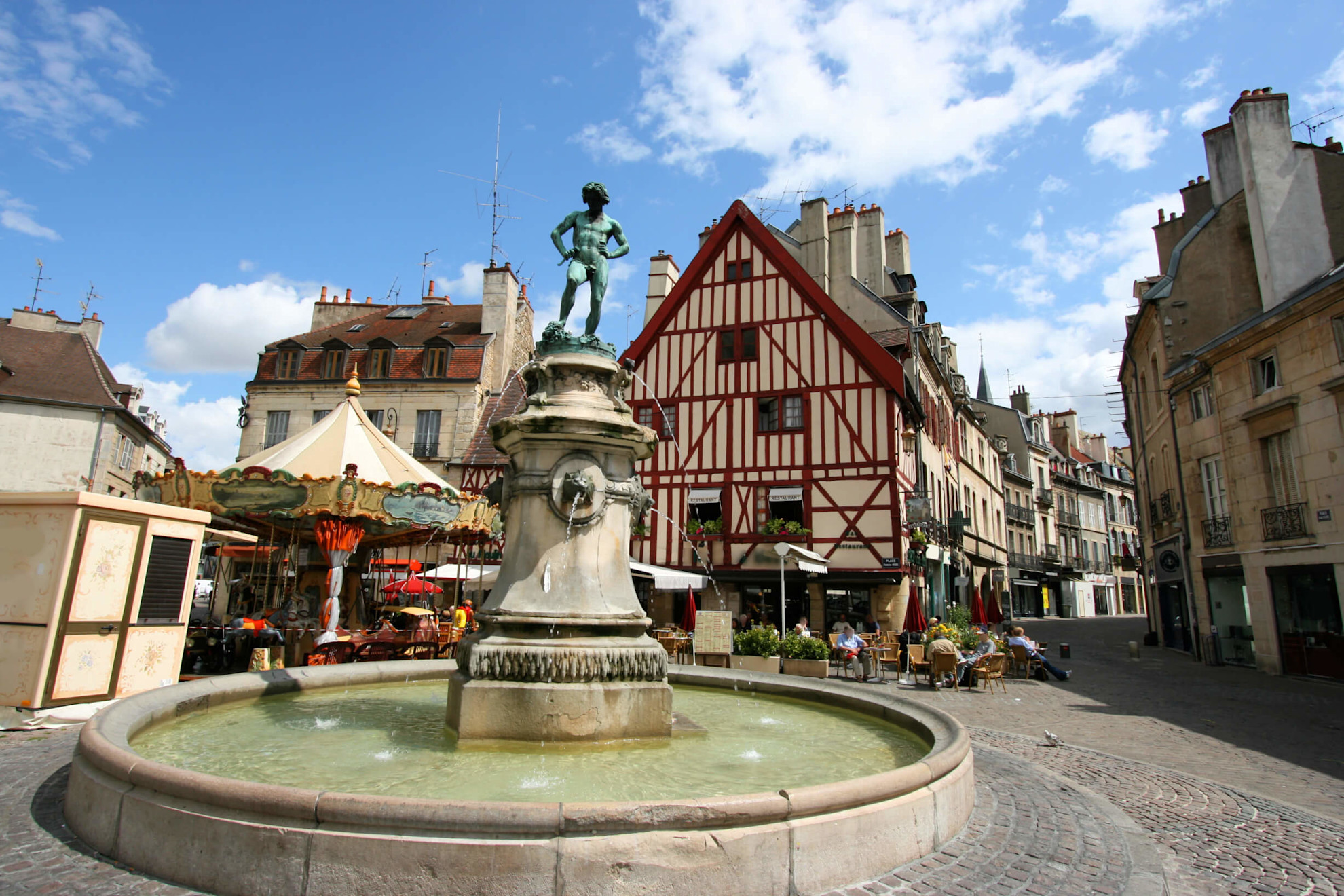 Statue and houses in Dijon