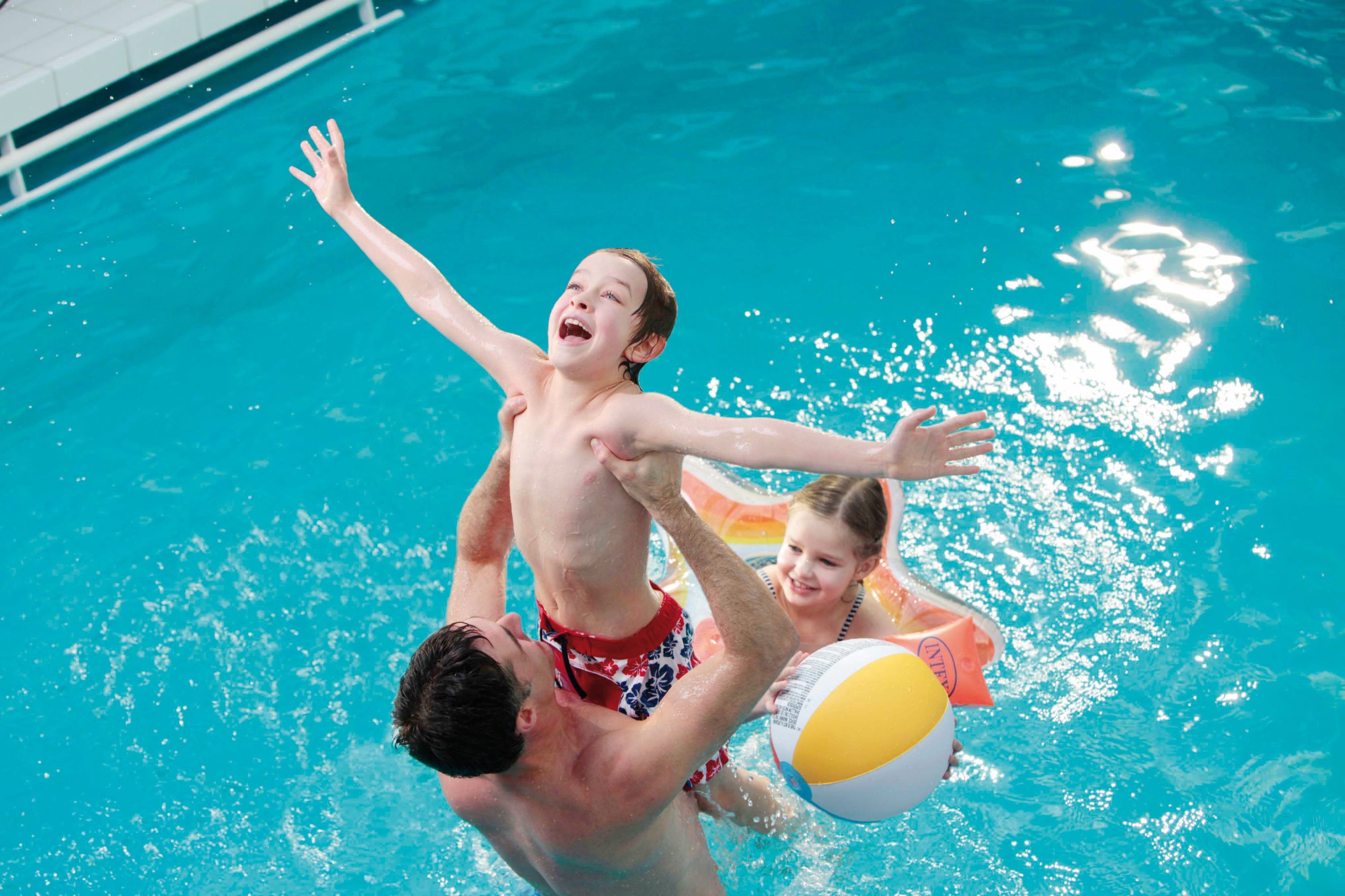Family in swimming pool on Pont Aven