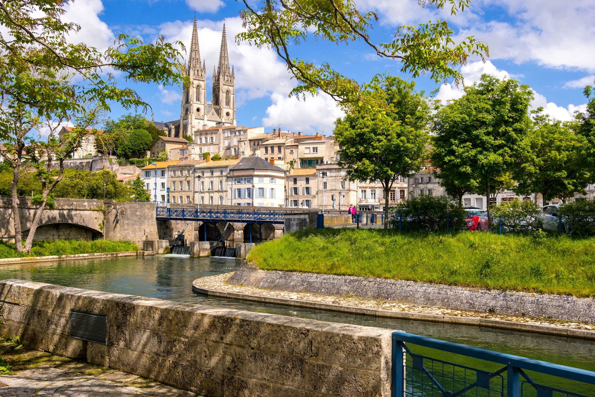 A view of St Andre's church on the Sevre Niortaise river at Niort