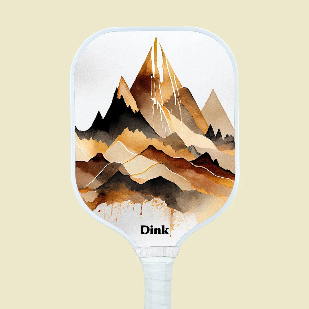 a custom pickleball paddle design from dink with golden mountains