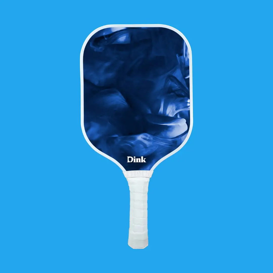 a custom pickleball paddle with dark blue smoke like design