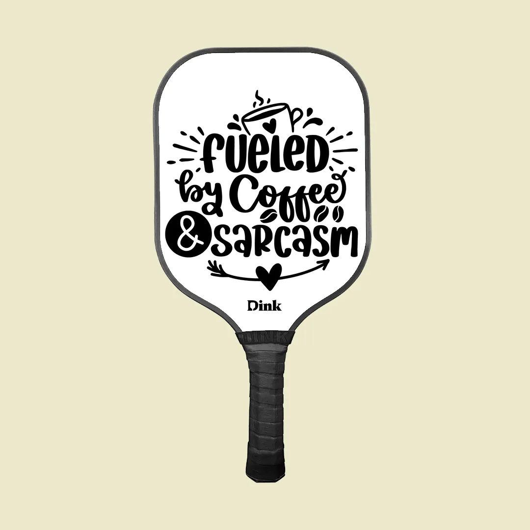 A custom pickleball paddle from Dink with a funny message design