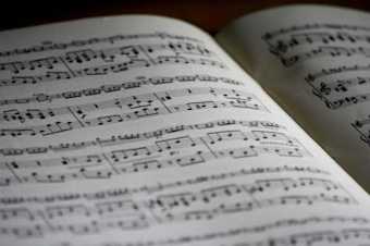 printed-musical-note-page-164821 logo