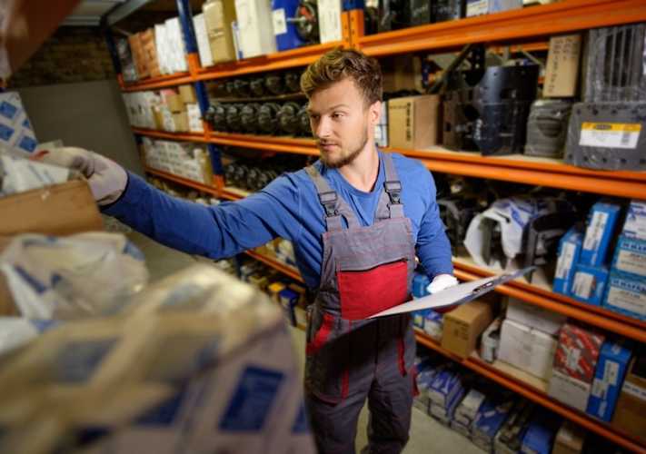 Student working in a warehouse