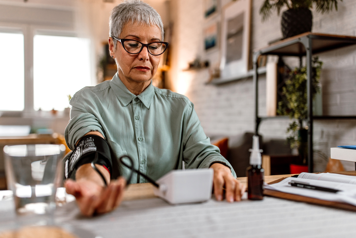 Person checking their blood pressure.