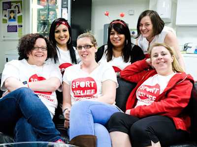Experian employees wearing Sport Relief t-shirts and deeley-boppers