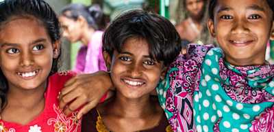 Three girls smiling