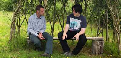 People chatting in a garden