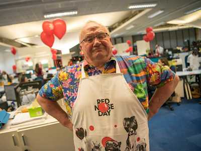 BPHA employee in Red Nose Day apron