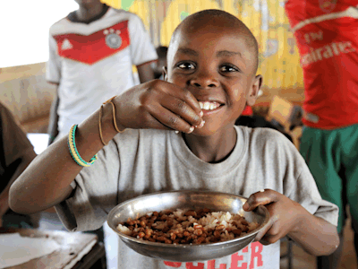 A child eating from a bowl