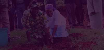 Wangari Maathai planting a tree