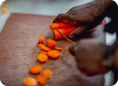 Carrots being chopped.