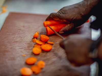 Carrots being chopped.