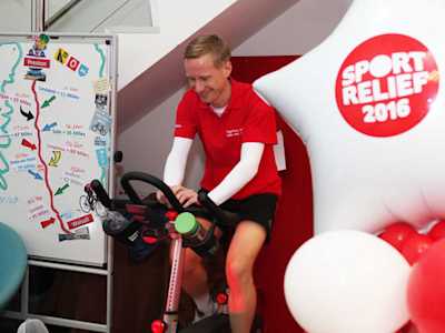 Call centre volunteer on an exercise bike