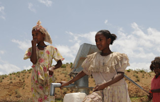Women near a well drilled in Eritrea as part of Clean Water projects.