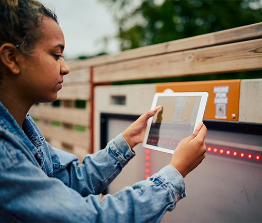 Girl using the iPad to access Yalp+