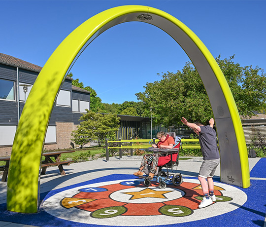 1355 NL Sona Ipse de Brugge 2021-591 (Large) Residents at Ipse de Bruggen play under the Lappset Sona Interactive dance and play arch