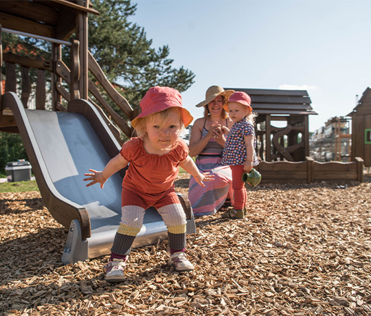 Flora - children playing text liftup shape