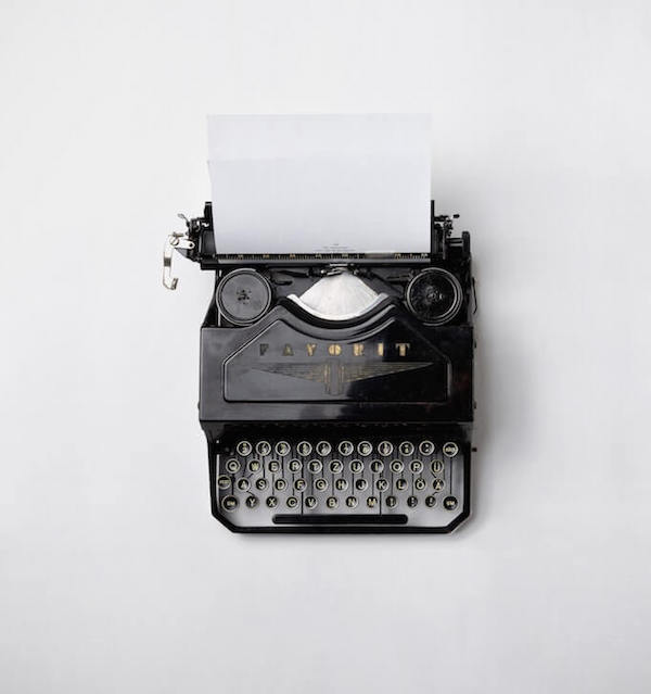Typewriter A vintage type writer on a white background.