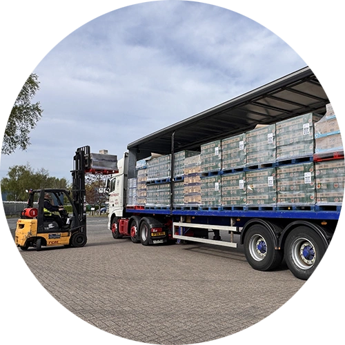 P&G donation in truck, with fork lift moving product