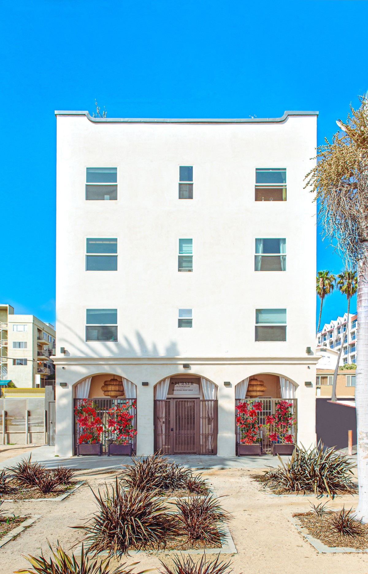 The Purser Apartment building was constructed in 1913 and reflects a vernacular
architectural style. This 30-unit building was designated a Santa Monica City Landmark in 2017 based on its significance as one of the last remaining apartment buildings that exemplified residential development, the *Seaside Terrace Tract*, along Santa Monica beachfront from the early 20th century.