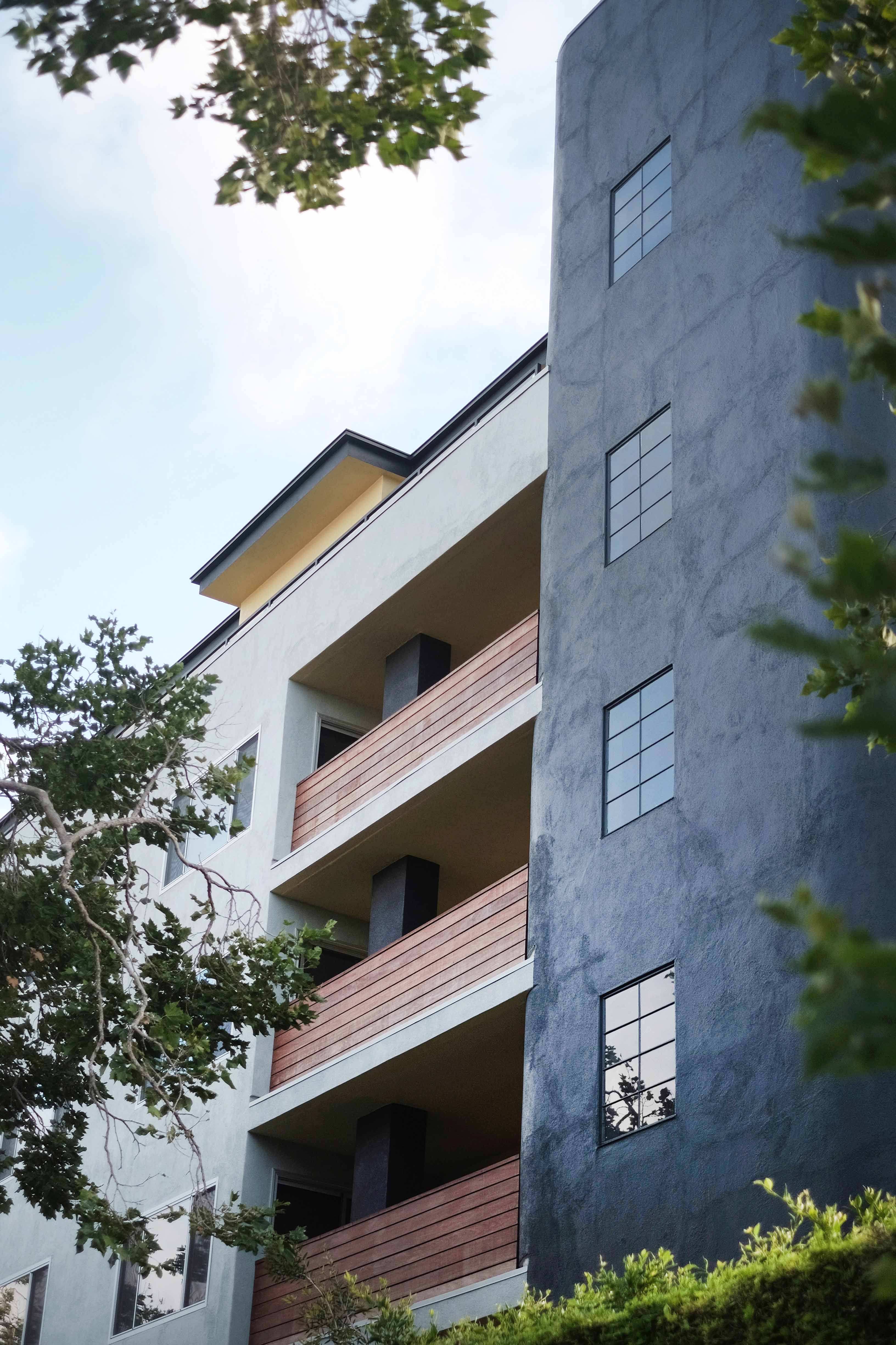 Maple Apartments Ivning Additional Improvements Included A Façade Renovation With Bold New Paint Colors And The Restoration Of Original Balconies In Addition To Landscaping At