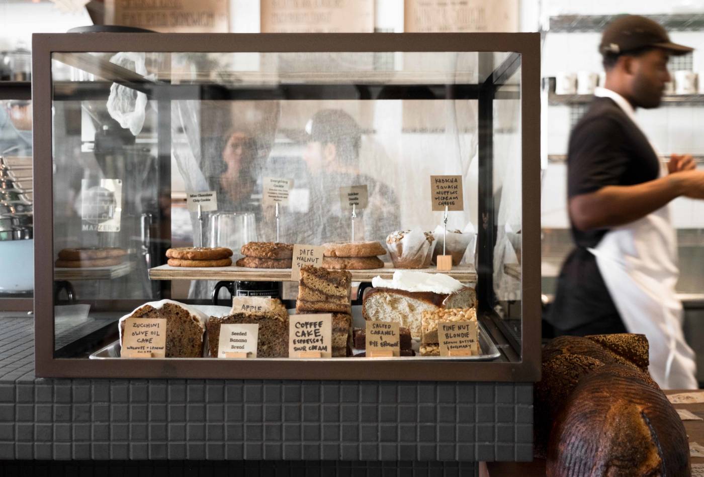 This neighborhood bakery and café, renowned for its naturally fermented sourdough bread, was immediately popular when it first opened in a space of our design. So popular that the owners asked us a year later to come back and work on an expansion into the adjacent space.