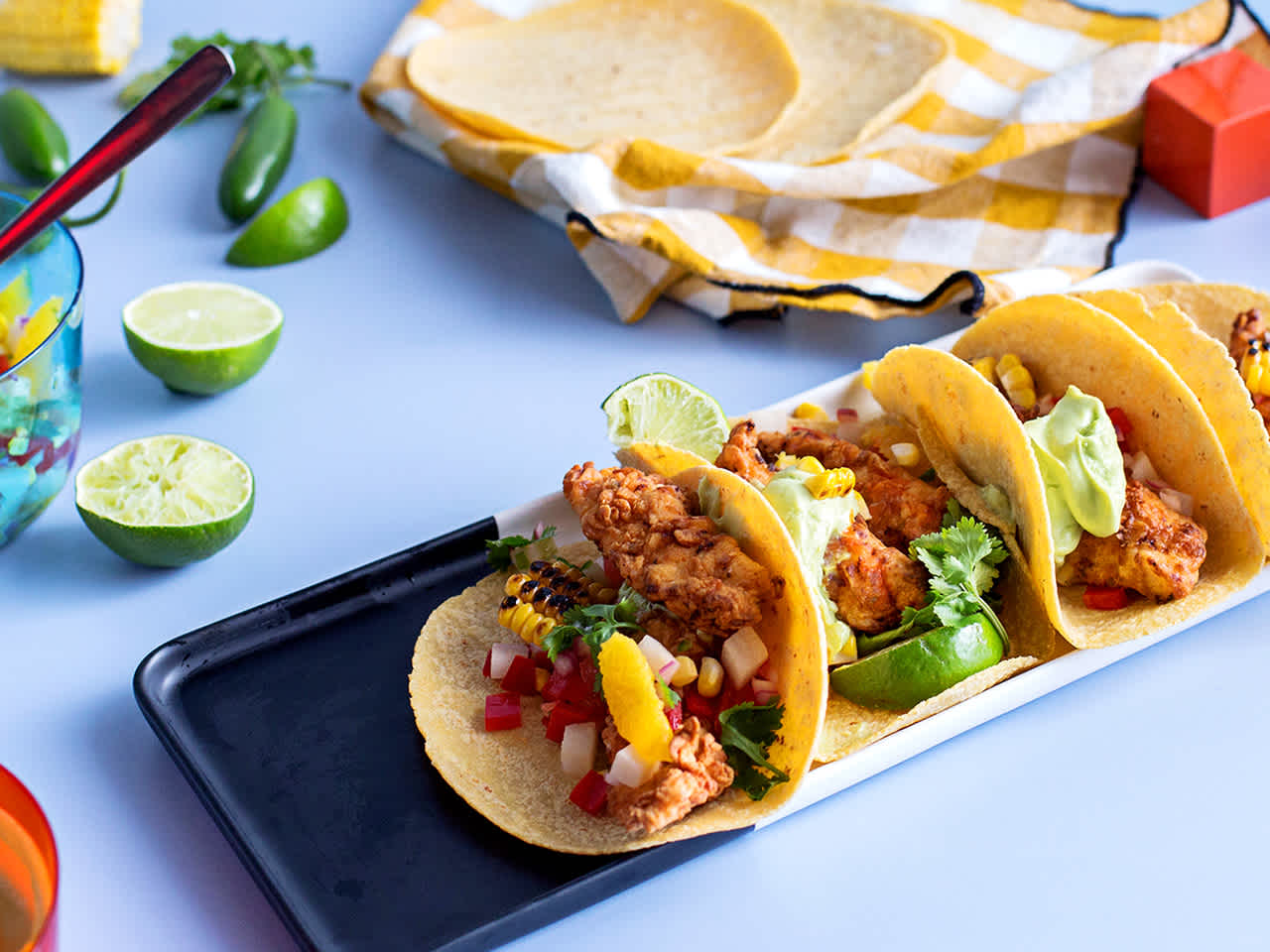Crispy Chicken Tacos with Jicama Corn Salsa and Avocado Crema