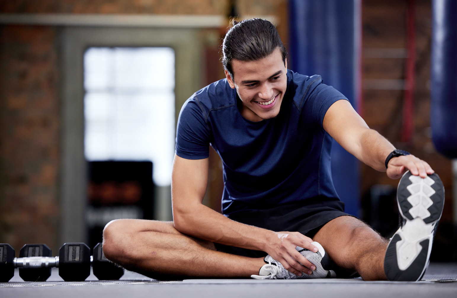 Person stretching or warming up before exercise.