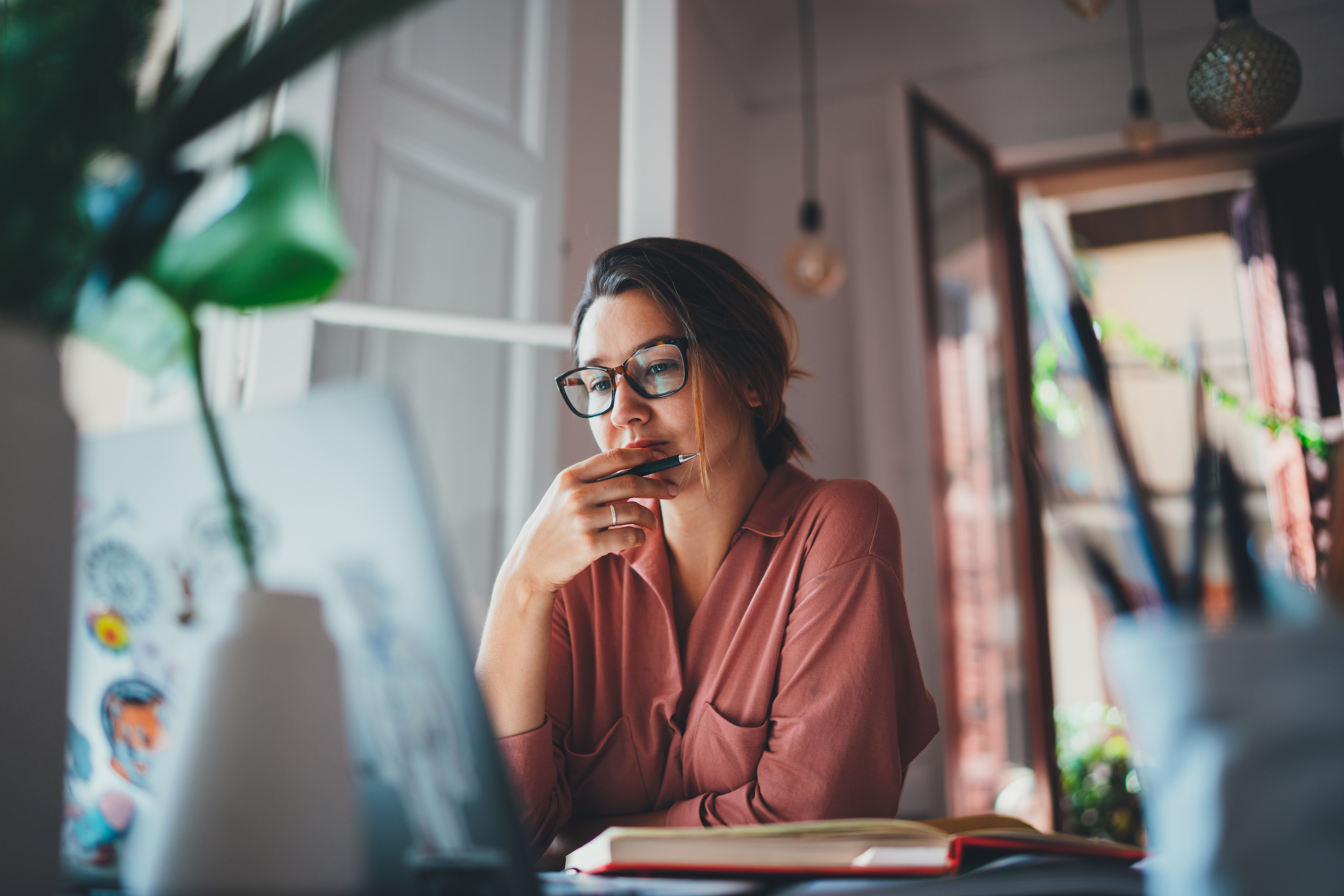 A woman who is carefully considering whether medical cost sharing is the right fit for her healthcare.