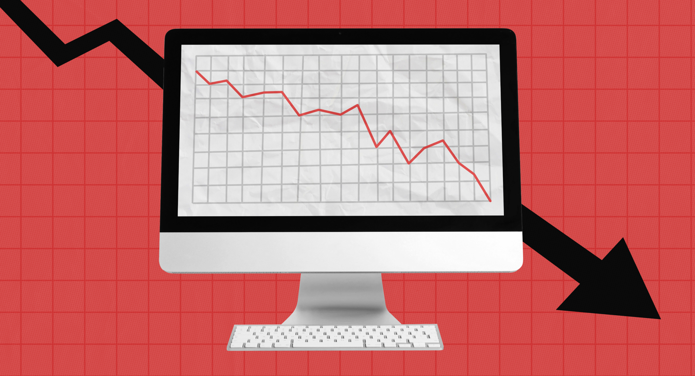 Illustration of a downward-trending graph on a computer, with an arrow pointing down behind it. 