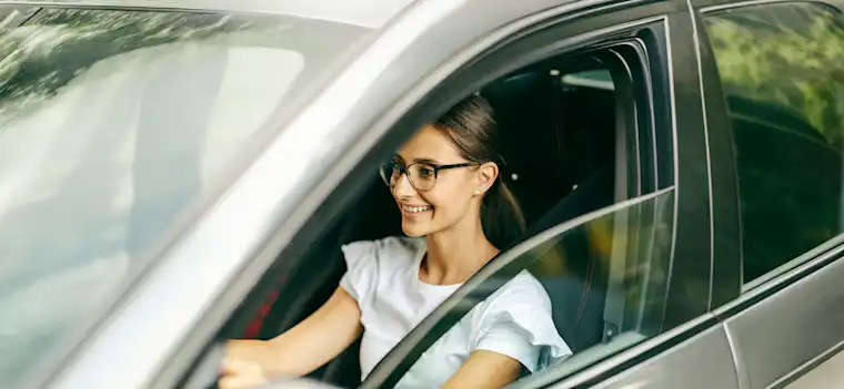 Woman riding a car