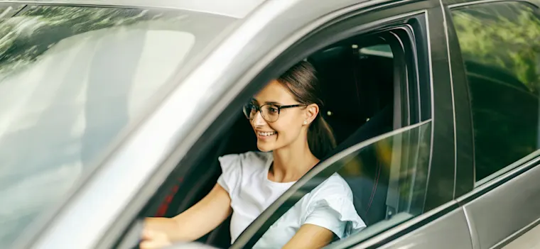 Woman riding a car