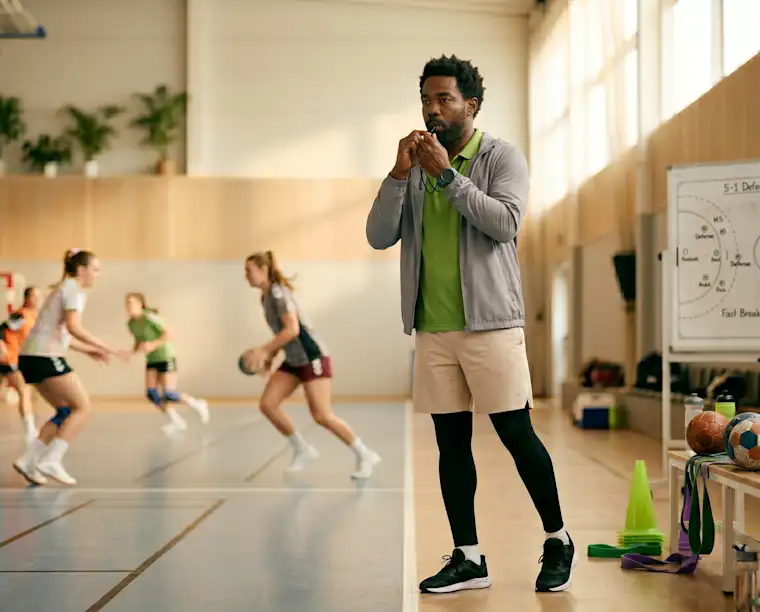 Beauty Wellbeing And Sport - Landscape - Handball Coach - Hero - Coach blowing whistle