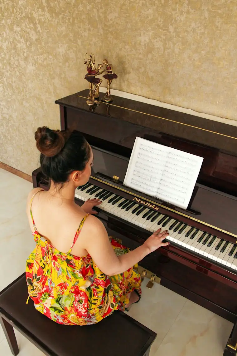 Arts Entertainment-portrait-music teacher- playing piano