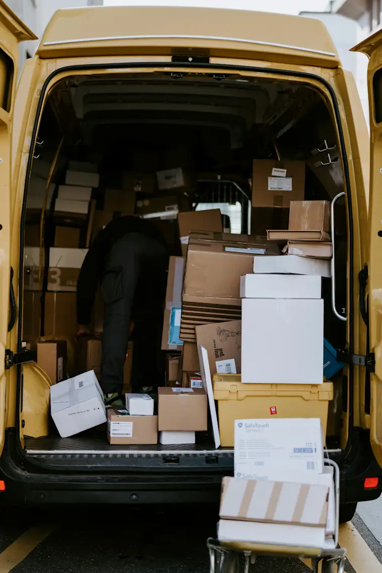 Courier - portrait - truck full with packages