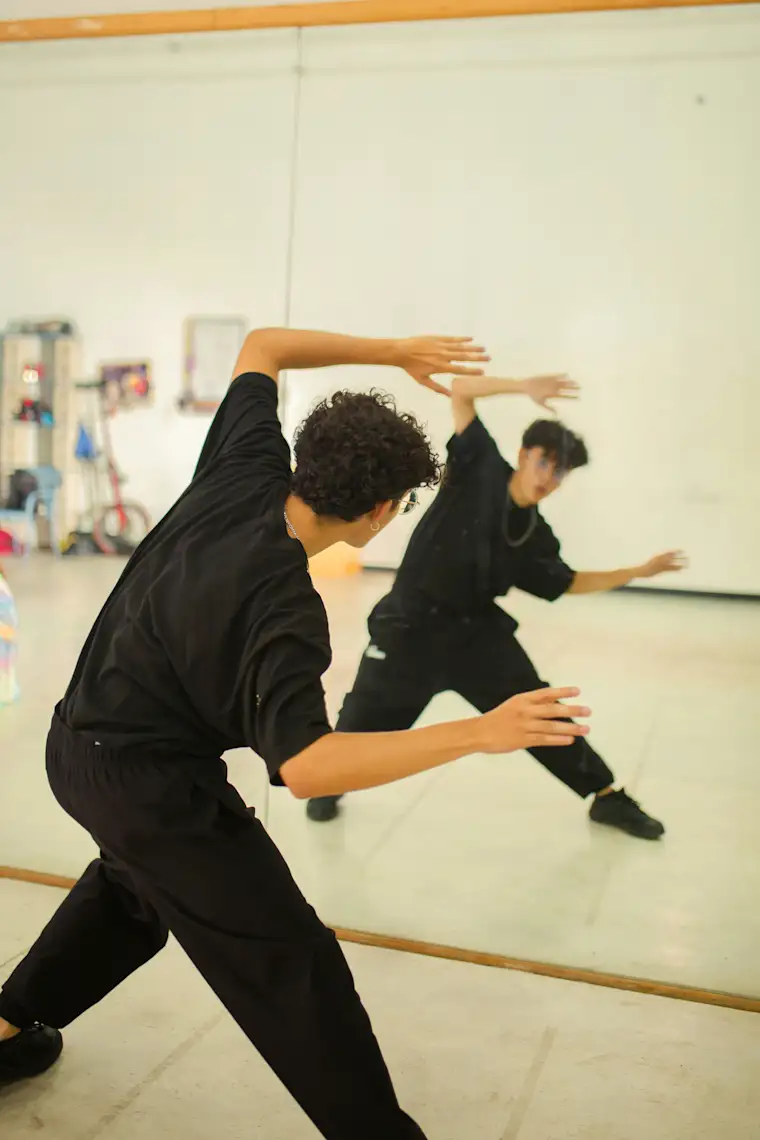 Arts Entertainment-portrait-dance school- dancer facing mirror