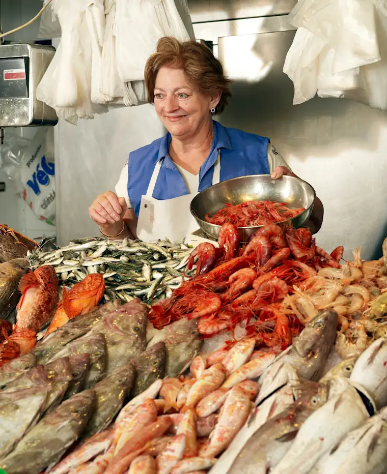 Food and Restaurants-portrait-fish shop-fr-Owner and fish display 2