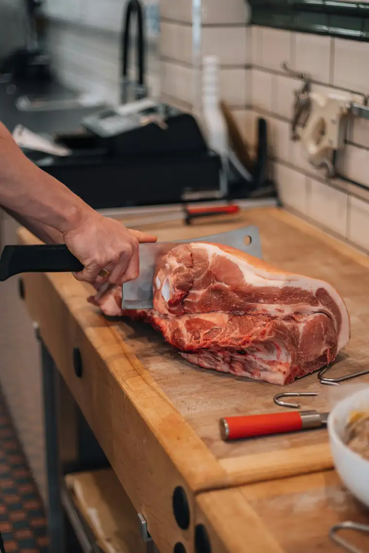 Food and Restaurants-portrait-butcher-fr-meat cutting