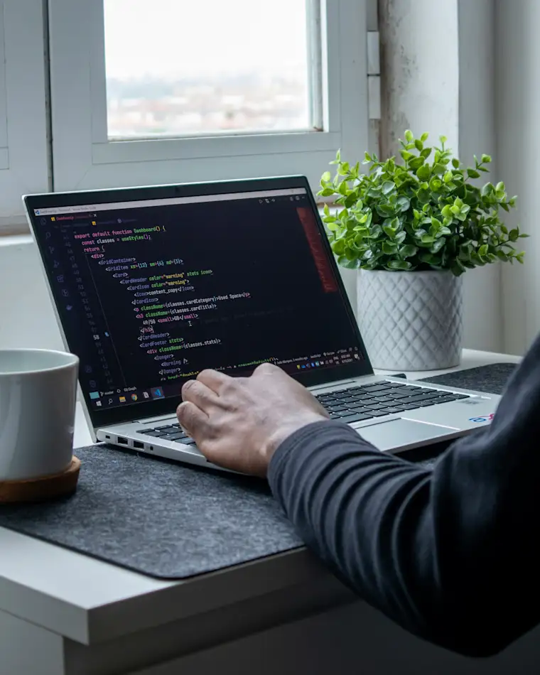 Developer - portrait - laptop with javascript