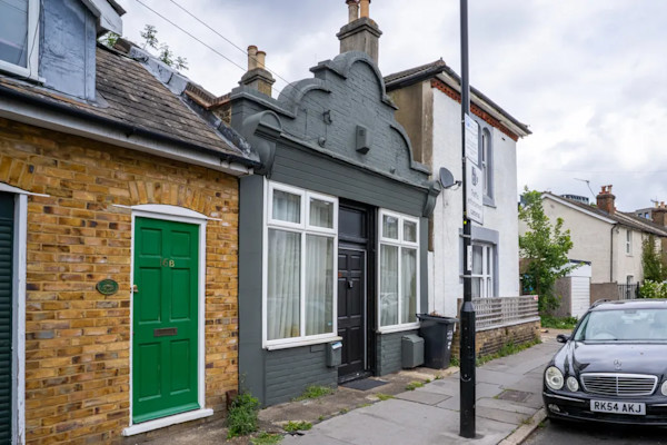 The exterior of a tiny terraced house for sale in Croydon
