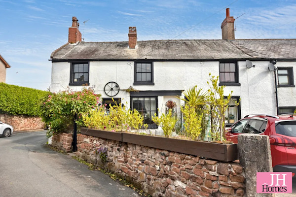 An end terrace cottage for sale in Cumbria