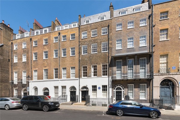 The exterior of an impressive 5 storey Georgian terraced home, where a third-floor flat sold for £12.65 million.