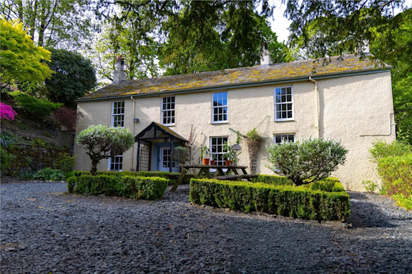 The exterior of a cottage that inspired Beatrix Potter in Cumbria