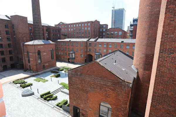 Aerial view of the world’s oldest steam-powered cotton mill, Manchester, now converted into apartments